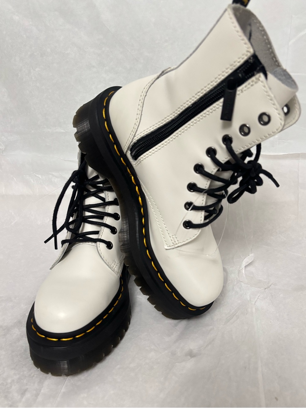 Dr. Martens Jadon platform boots: white leather, chunky Quad sole, black laces,